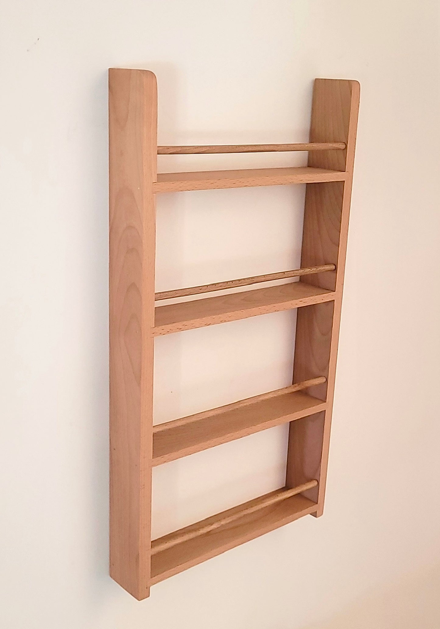 Empty solid beech cupboard door spice rack