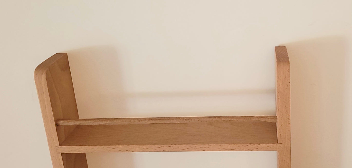 Open top shelf of a 4 tier solid beech spice rack