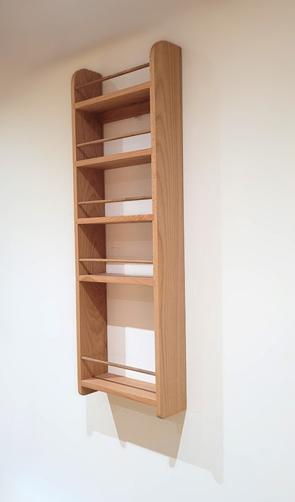 Empty solid beech butler pantrylarder rack with 4 spice shelves and a bottle shelf
