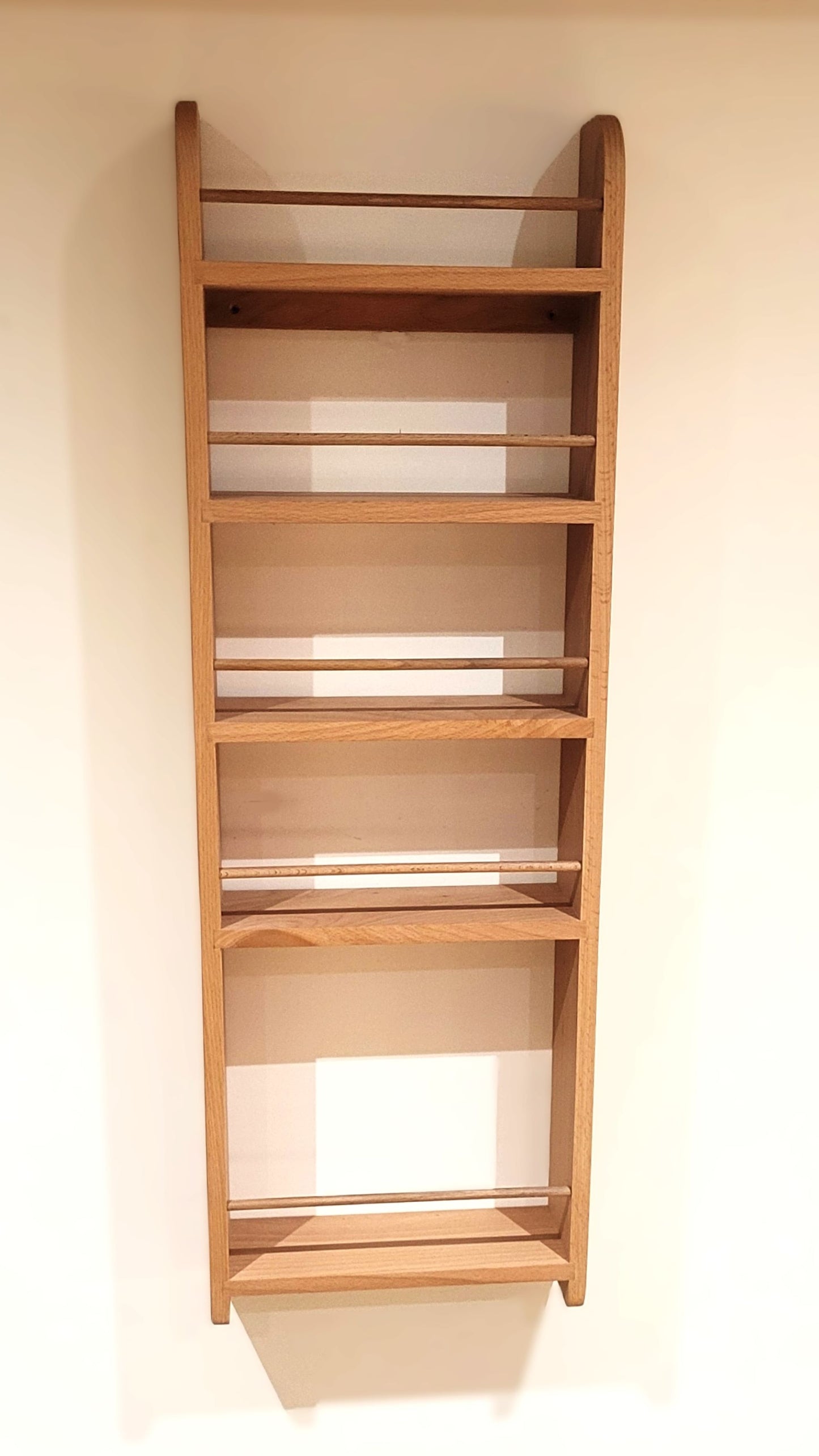 Front view of an empty solid beech butler pantry larder rack with 5 shelves including bottle shelf