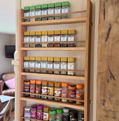 Solid oak spice rack for door hanging with 5 shelves full of spice jars