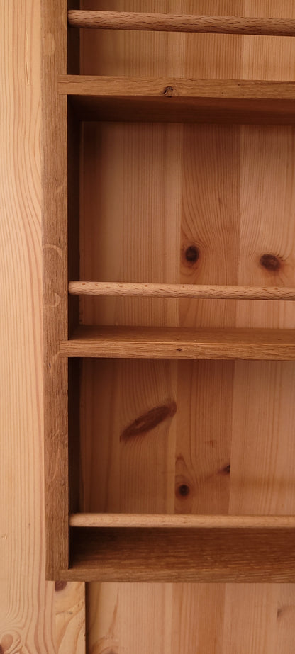 Empty solid oak spice rack with wooden rails