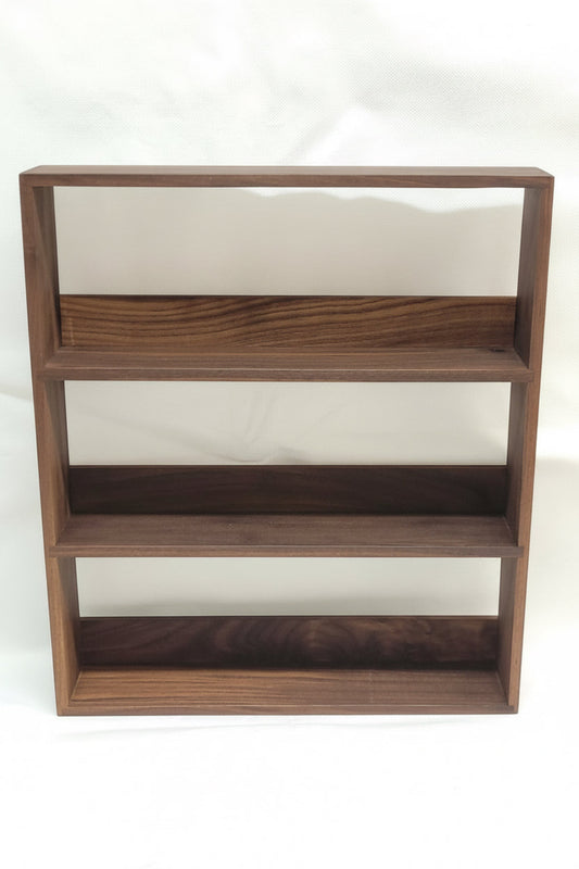 Empty walnut spice rack 3 shelves on a white background